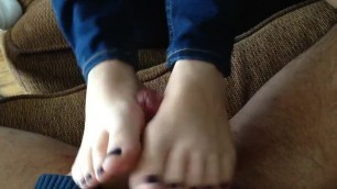 Girl gives Footjob in Jeans with Purple Toenails