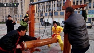 Chinese Kung Fu Master Demonstrates 'ball-breaking Stamina'