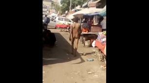 Indian Man Roaming Nude in Market