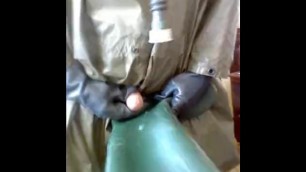 A Good Wank in Green Rubber Poncho with a Nice Cumshot on a Rubber Welly,