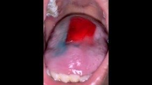 Teen Girl Eating Candy Mouth up Close POV