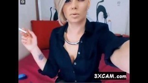 classy short haired hot blonde smoking on webcam