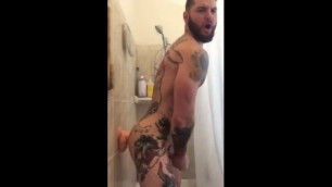 Tatted Hunk Fucks Dildo in Shower Until He Cums